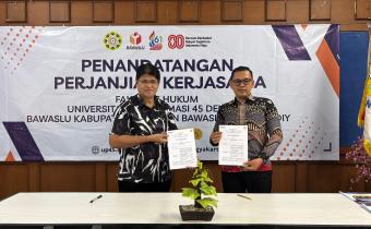 Ketua Bawaslu Kota Yogyakarta dan Dekan Fakultas Hukum Universitas Proklamasi 45 menandatangani Perjanjian Kerja Sama